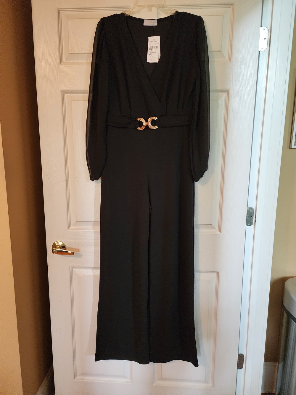 Black Long-Sleeve V-Neck Jumpsuit with Gold Buckle